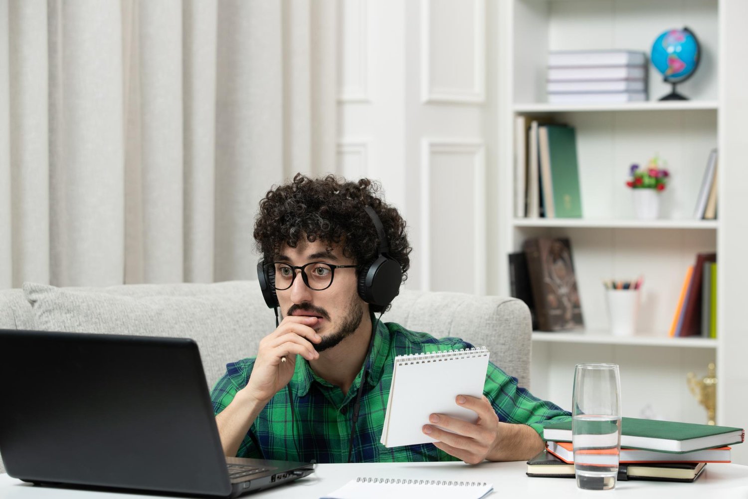 Teen concentrating at desk before homework